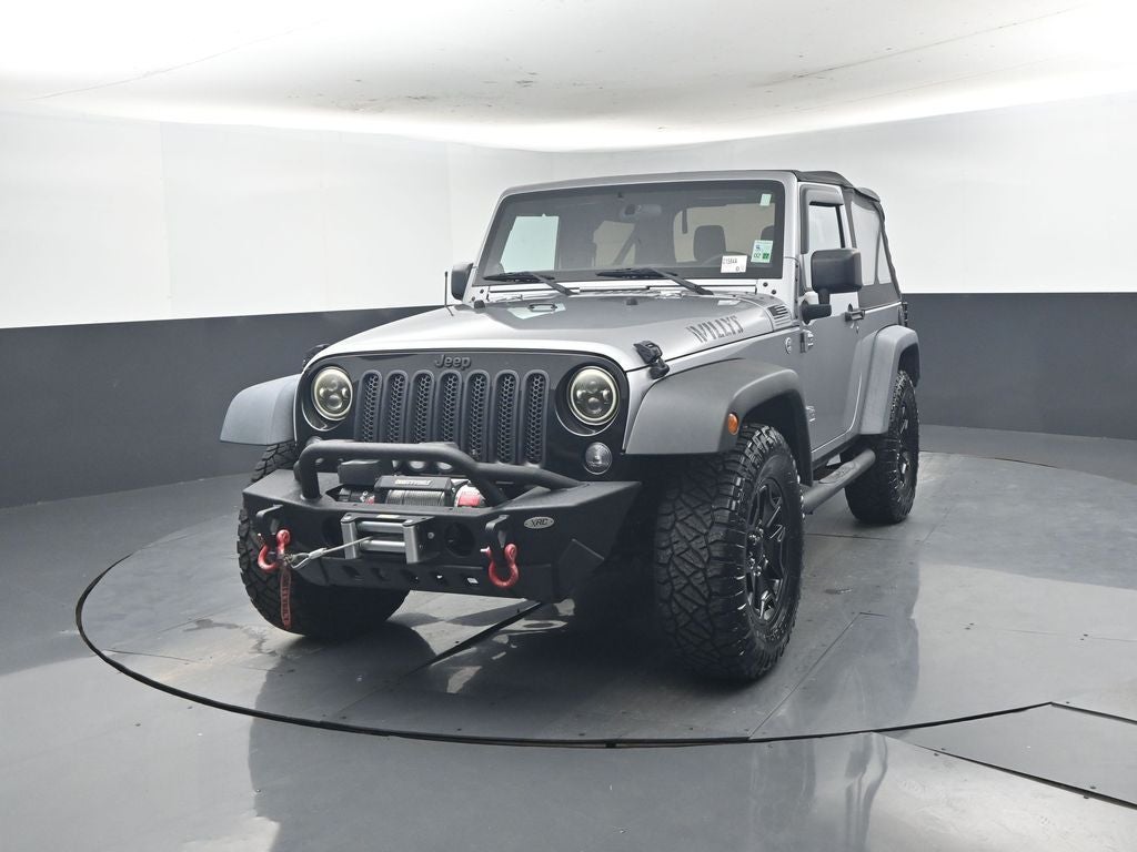 Used 2014 Jeep Wrangler Willys Wheeler with VIN 1C4AJWAG8EL310242 for sale in LaPlace, LA